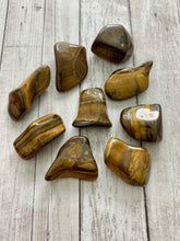 Load image into Gallery viewer, Tiger&#39;s Eye Tumbled Crystal (Large)
