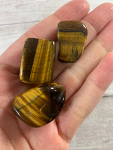 Load image into Gallery viewer, Tiger&#39;s Eye Tumbled Crystal (Small)
